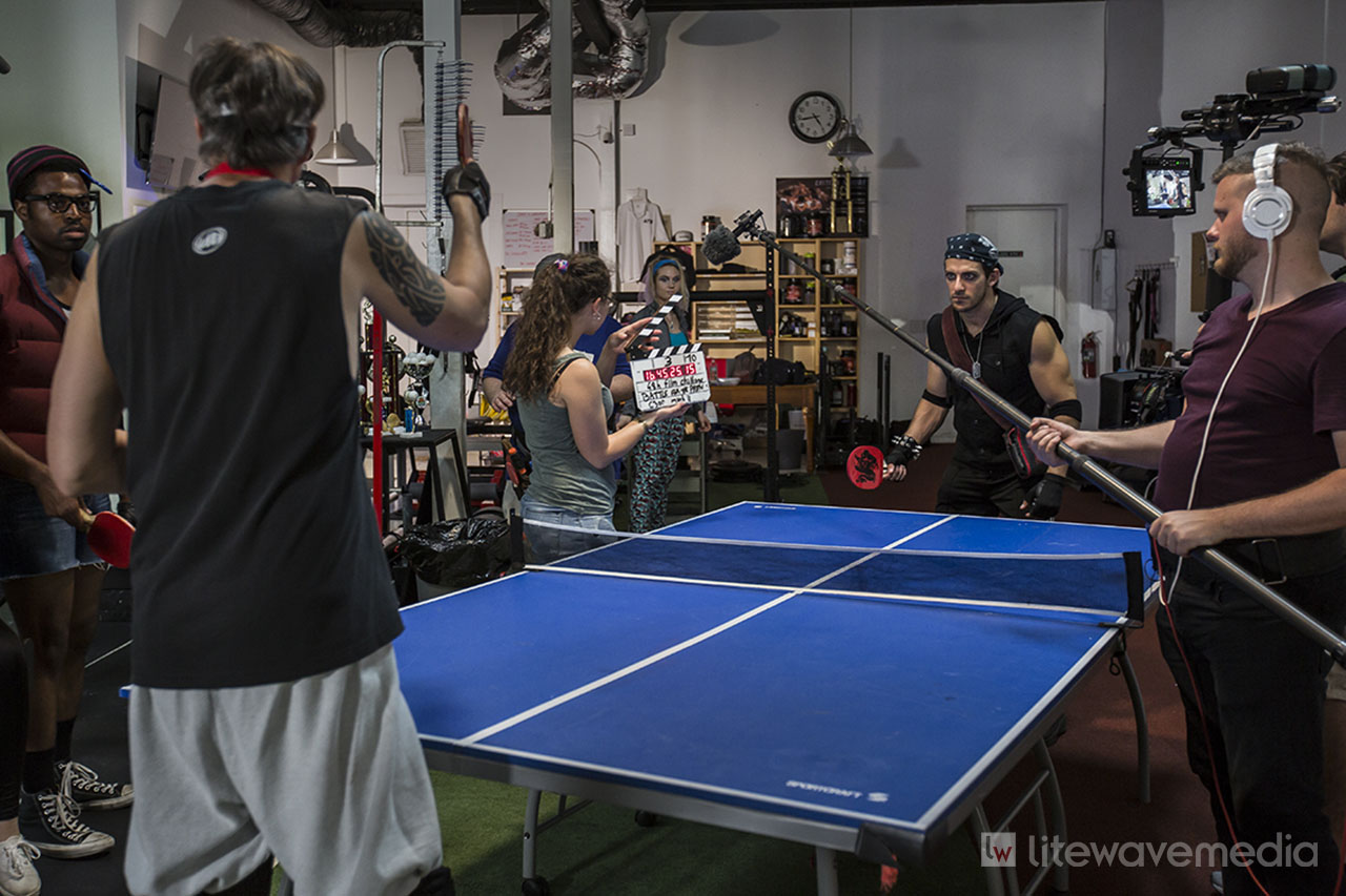 St. Petersburg film crew shoots ping pong scene in local business. 